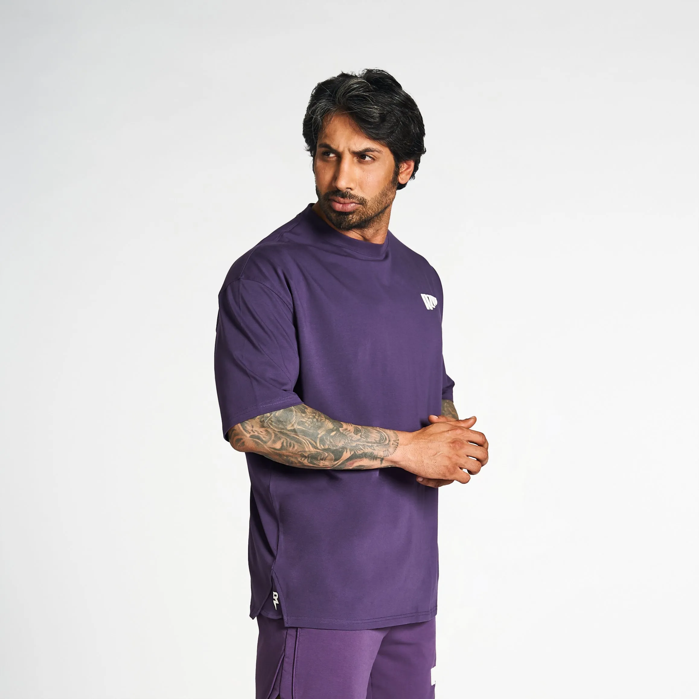 Never Settle Oversized Drop-Shoulder Tee - Purple No Fade Technology