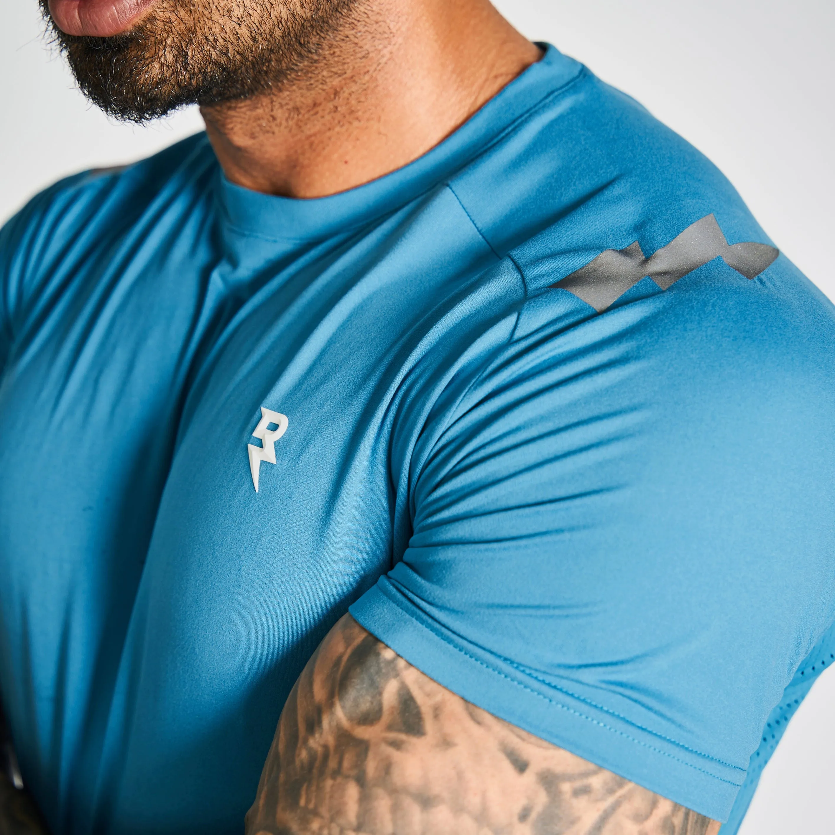 Reversible Design Concept Longline Hemline Mesh Performance T-Shirt - Teal