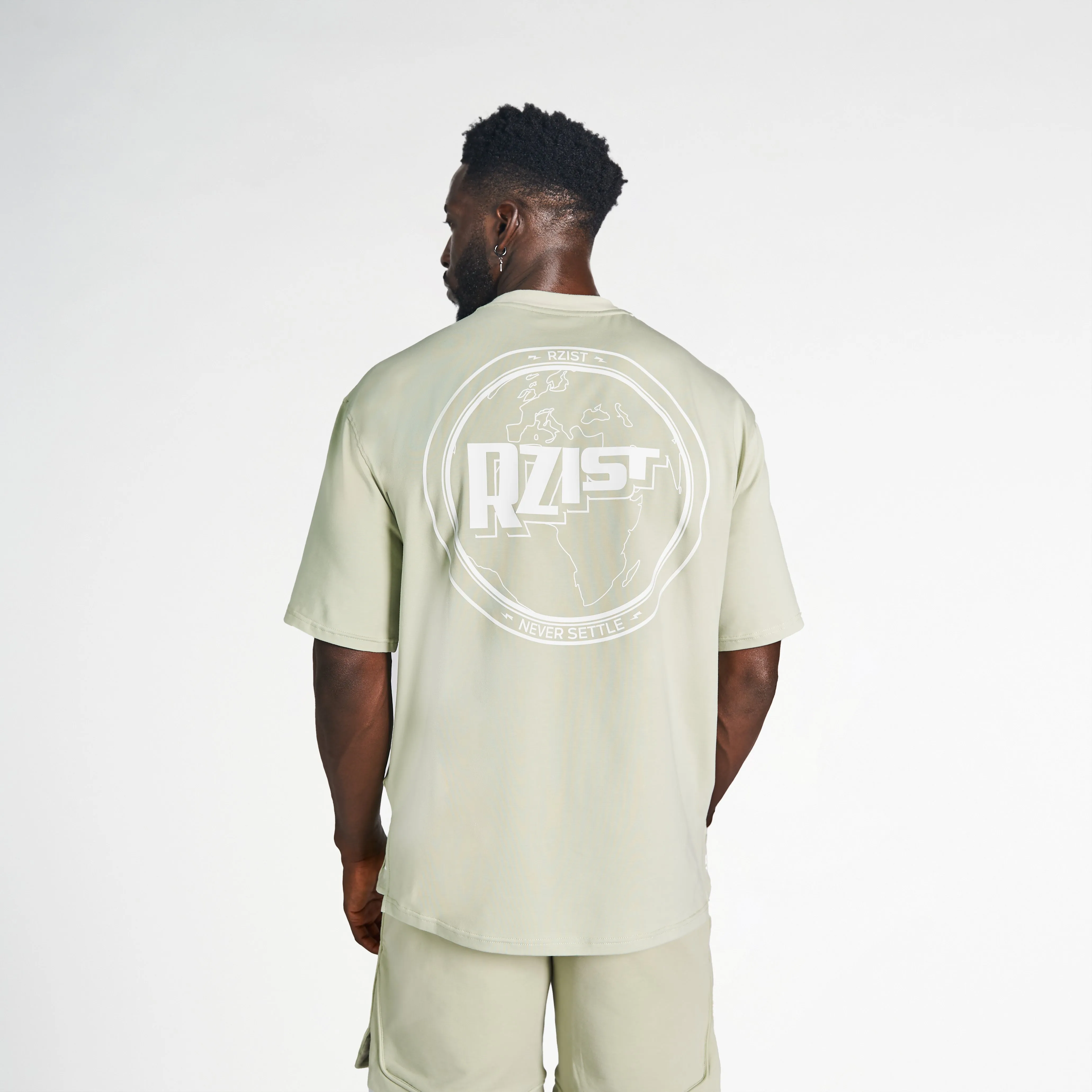 Never Settle Oversized Drop-Shoulder Tee - Desert Sage No-Shrink Fabric Perfect for Vacation
